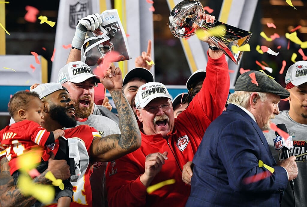 Feb 2, 2020; Miami Gardens, Florida, USA; Kansas City Chiefs head coach Andy Reid hoist the Vince Lombardi Trophy after defeating the San Francisco 49ers in Super Bowl LIV at Hard Rock Stadium. Mandatory Credit: Robert Deutsch-USA TODAY Sports