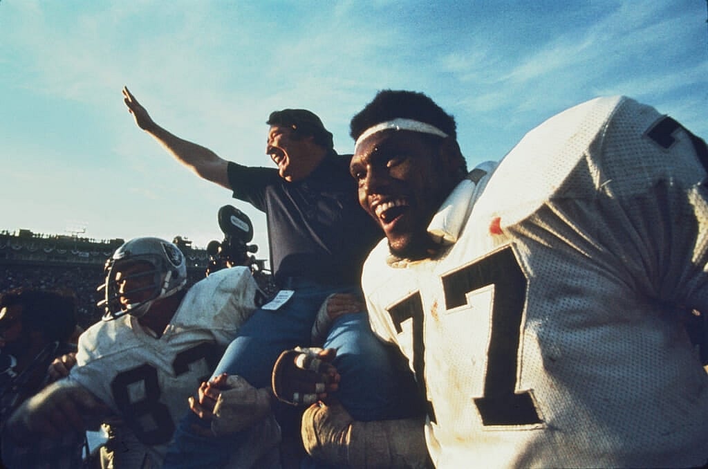 Raiders' head coach John Madden celebrates in the Oakland 32-14 win over the Vikings at the Super Bowl XI game of the Oakland Raiders vs the Minnesota Vikings played at the Rose Bowl in Pasadena, California on  January 9, 1977. (Photo by Dennis Desprois/Getty Images)
