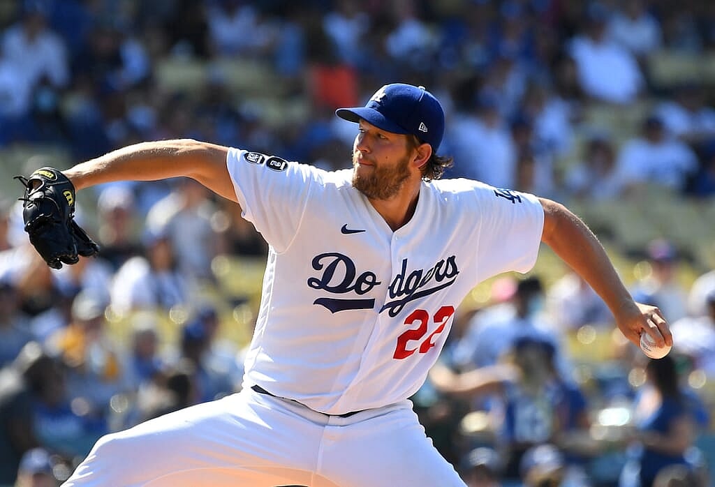 Jun 27, 2021; Los Angeles, California, USA;  Los Angeles Dodgers starting pitcher Clayton Kershaw (22) pitches in the first inning of the game against the Chicago Cubs at Dodger Stadium. Mandatory Credit: Jayne Kamin-Oncea-USA TODAY Sports