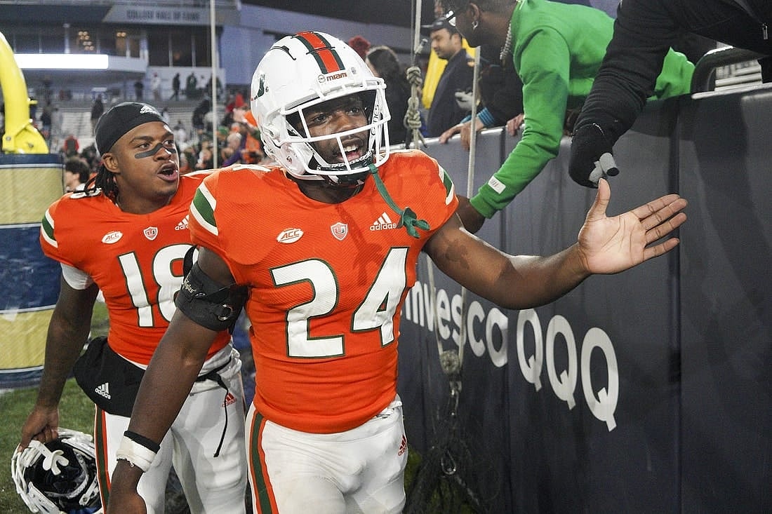 Nov 12, 2022; Atlanta, Georgia, USA; Miami Hurricanes safety Kamren Kinchens (24) celebrates with fans after a victory against the Georgia Tech Yellow Jackets at Bobby Dodd Stadium. Mandatory Credit: Brett Davis-USA TODAY Sports