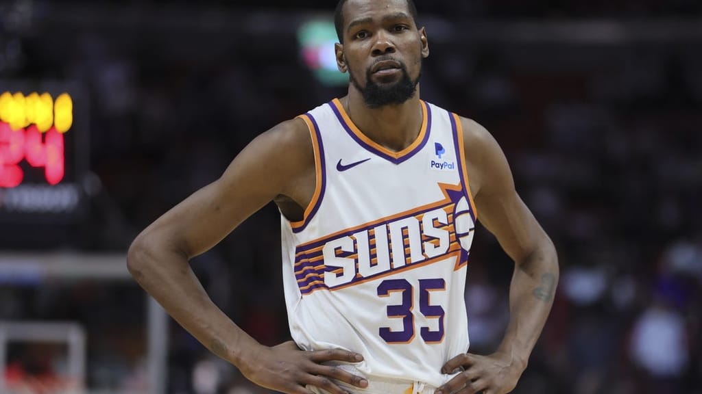 Jan 29, 2024; Miami, Florida, USA; Phoenix Suns forward Kevin Durant (35) looks on against the Miami Heat during the fourth quarter at Kaseya Center. Mandatory Credit: Sam Navarro-USA TODAY Sports