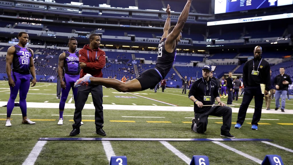 Julio Cortez/AP NFL Combine broad jump