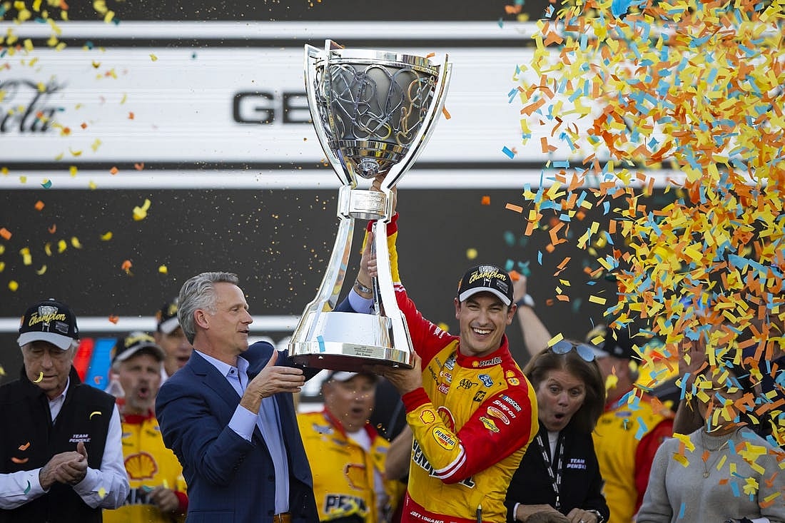 Nov 6, 2022; Avondale, Arizona, USA; NASCAR Cup Series driver Joey Logano celebrates after winning the Cup Championship at Phoenix Raceway. Mandatory Credit: Mark J. Rebilas-USA TODAY Sports