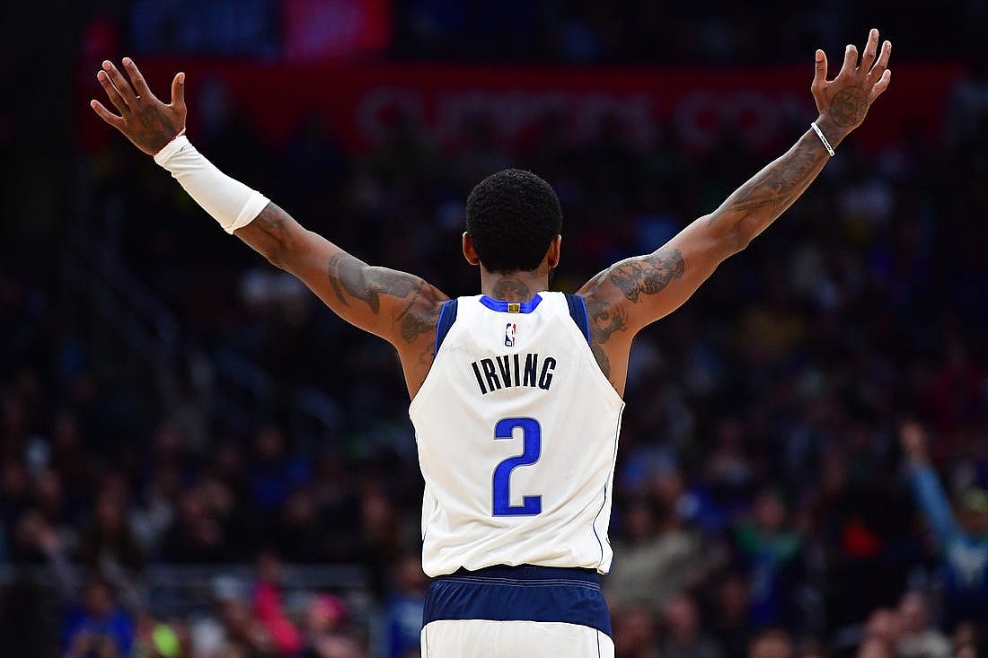  Dallas Mavericks guard Kyrie Irving (2) reacts against the Los Angeles Clippers during the second half at Crypto.com Arena. Mandatory Credit: Gary A. Vasquez-USA TODAY Sports
