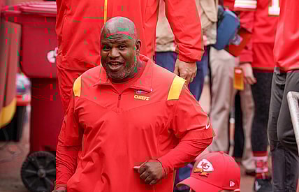 Oct 16, 2022; Kansas City, Missouri, USA; Kansas City Chiefs offensive coordinator Eric Bieniemy leaves the field against the Buffalo Bills prior to the game at GEHA Field at Arrowhead Stadium. Mandatory Credit: Denny Medley-USA TODAY Sports