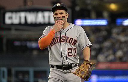 Jun 23, 2023; Los Angeles, California, USA;  Houston Astros second baseman Jose Altuve (27) walks off the field following the sixth inning against the Los Angeles Dodgers at Dodger Stadium. Mandatory Credit: Jayne Kamin-Oncea-USA TODAY Sports