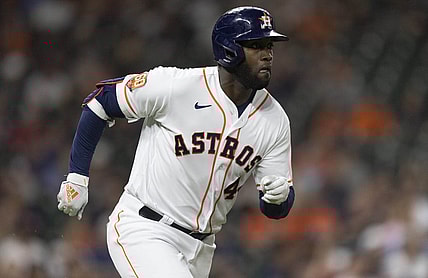 Jul 5, 2022; Houston, Texas, USA; Houston Astros left fielder Yordan Alvarez (44) hits a single against the Kansas City Royals in the fifth inning at Minute Maid Park. Mandatory Credit: Thomas Shea-USA TODAY Sports