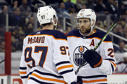 Apr 26, 2022; Pittsburgh, Pennsylvania, USA; Edmonton Oilers center Connor McDavid (97) and center Leon Draisaitl (29) talk prior to a face-off against the Pittsburgh Penguins during the first period at PPG Paints Arena. Mandatory Credit: Charles LeClaire-USA TODAY Sports