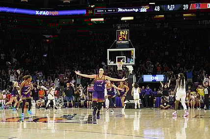 Aug 3, 2023; Phoenix, Arizona, USA; Phoenix Mercury guard Diana Taurasi (3) celebrates her 10,000th career point during the second half of the game against the Atlanta Dream at Footprint Center. Mandatory Credit: Joe Camporeale-USA TODAY Sports