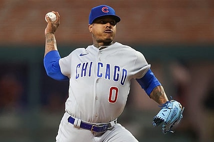 Sep 28, 2023; Atlanta, Georgia, USA; Chicago Cubs starting pitcher Marcus Stroman (0) throws against the Atlanta Braves in the first inning at Truist Park. Mandatory Credit: Brett Davis-USA TODAY Sports
