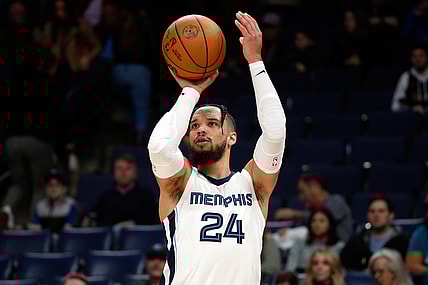 Nov 24, 2021; Memphis, Tennessee, USA; Memphis Grizzles guard Dillon Brooks (24) shoots for three during the second half against the Toronto Raptors at FedExForum. Mandatory Credit: Petre Thomas-USA TODAY Sports