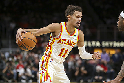 Dec 17, 2021; Atlanta, Georgia, USA; Atlanta Hawks guard Trae Young (11) dribbles against the Denver Nuggets in the second half at State Farm Arena. Mandatory Credit: Brett Davis-USA TODAY Sports