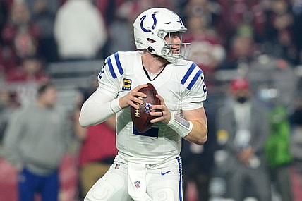 Dec 25, 2021; Glendale, Arizona, USA; Indianapolis Colts quarterback Carson Wentz (2) drops back to pass against the Arizona Cardinals during the first half at State Farm Stadium. Mandatory Credit: Joe Camporeale-USA TODAY Sports