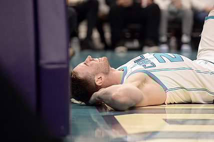 Feb 7, 2022; Charlotte, North Carolina, USA;  Charlotte Hornets guard forward Gordon Hayward (20) lays injured after a hard fall during the first half against the Toronto Raptors at the Spectrum Center. Mandatory Credit: Sam Sharpe-USA TODAY Sports