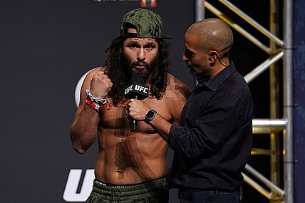 Apr 23, 2021; Jacksonville, Florida, USA; Jorge Masvidal (L) talks with UFC play-by-play commentator Jon Anik (R) during weigh-ins for UFC 261 at VyStar Veterans Memorial Arena. Mandatory Credit: Jasen Vinlove-USA TODAY Sports