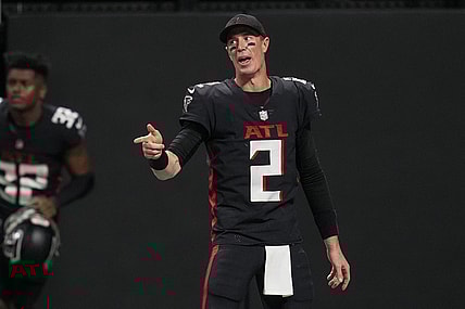 Jan 9, 2022; Atlanta, Georgia, USA; Atlanta Falcons quarterback Matt Ryan (2) reacts with New Orleans Saints defensive end Cameron Jordan (94) (not shown) on the field after the game at Mercedes-Benz Stadium. Mandatory Credit: Dale Zanine-USA TODAY Sports