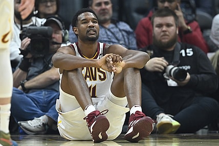 Mar 28, 2022; Cleveland, Ohio, USA; Cleveland Cavaliers center Evan Mobley (4) reacts after he was knocked to the floor in the second quarter against the Orlando Magic at Rocket Mortgage FieldHouse. Mandatory Credit: David Richard-USA TODAY Sports