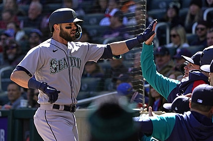 Apr 8, 2022; Minneapolis, Minnesota, USA;  Seattle Mariners right fielder Mitch Haniger (17) celebrates his two-run home run off of Minnesota Twins starting pitcher Joe Ryan (41) with his teammates during the first inning at Target Field. Mandatory Credit: Nick Wosika-USA TODAY Sports