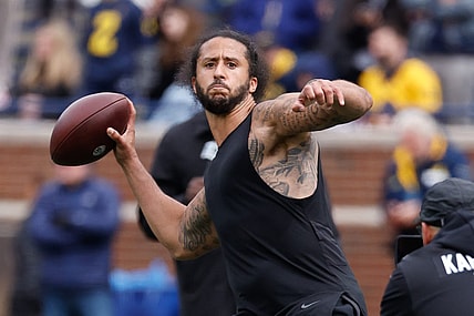 Apr 2, 2022; Ann Arbor, Michigan, USA;  Colin Kaepernick passes during halftime at the Michigan Spring game at Michigan Stadium. Mandatory Credit: Rick Osentoski-USA TODAY Sports
