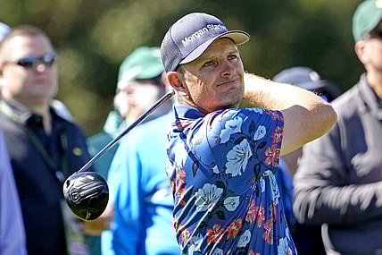 Apr 8, 2022; Augusta, Georgia, USA; Justin Rose plays his shot from the eighth tee during the second round of The Masters golf tournament. Mandatory Credit: Michael Madrid-USA TODAY Sports