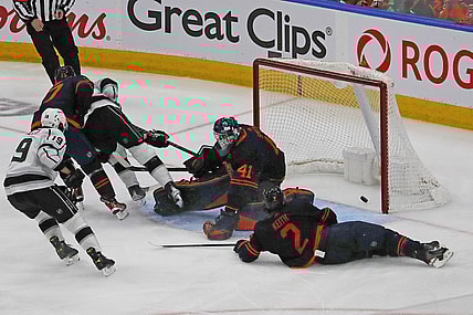 May 10, 2022; Edmonton, Alberta, CAN; Los Angeles Kings forward Adrian Kempe (9) scores the over-time winning gaol against Edmonton Oilers goaltender Mike Smith (41) in game five of the first round of the 2022 Stanley Cup Playoffs at Rogers Place. Mandatory Credit: Perry Nelson-USA TODAY Sports