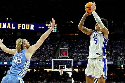 Apr 2, 2022; New Orleans, LA, USA; Duke Blue Devils forward Paolo Banchero (5) shoots the ball against North Carolina Tar Heels forward Brady Manek (45) in the 2022 NCAA men's basketball tournament Final Four semifinals at Caesars Superdome. Mandatory Credit: Robert Deutsch-USA TODAY Sports