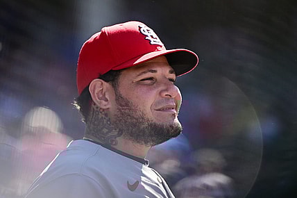 Jun 3, 2022; Chicago, Illinois, USA; St. Louis Cardinals catcher Yadier Molina (4) looks on from the dugout in the seventh inning against the Chicago Cubs at Wrigley Field. Mandatory Credit: Quinn Harris-USA TODAY Sports