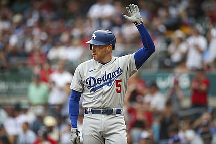 Jun 25, 2022; Atlanta, Georgia, USA; Los Angeles Dodgers first baseman Freddie Freeman (5) acknowledges the crowd before an at bat against the Atlanta Braves in the first inning at Truist Park. Mandatory Credit: Brett Davis-USA TODAY Sports