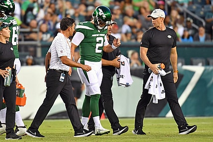 Aug 12, 2022; Philadelphia, Pennsylvania, USA; New York Jets quarterback Zach Wilson (2)  is helped off the field against the Philadelphia Eagles during the first quarter at Lincoln Financial Field. Mandatory Credit: Eric Hartline-USA TODAY Sports