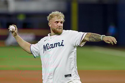 Aug 16, 2022; Miami, Florida, USA; YouTube personality and boxer Jake Paul throws a ceremonial first pitch prior to the game between the Miami Marlins and the San Diego Padres at loanDepot Park. Mandatory Credit: Sam Navarro-USA TODAY Sports