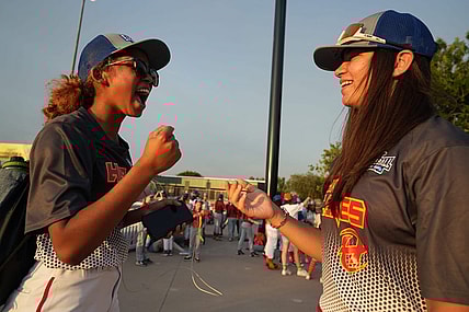 Riley Wilson, 14, left, and Laney Fukuoka, 15, California teammates on the Hurricanes share a laugh during the opening ceremony for Baseball for All, an organization focused on giving girls an opportunity to play baseball, at Hohokam Stadium in Mesa, Ariz. on Wednesday, July 20, 2022.

Baseball For All 17