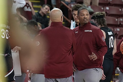 Nov 18, 2022; Charleston, South Carolina, USA; South Carolina Gamecocks head coach Lamont Paris talks with his staff in the second half against the Davidson Wildcats at TD Arena. Mandatory Credit: David Yeazell-USA TODAY Sports