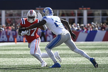 Oct 9, 2022; Foxborough, Massachusetts, USA; New England Patriots running back Damien Harris (37) runs with the ball while Detroit Lions safety Will Harris (25) defends during the first half at Gillette Stadium. Mandatory Credit: Bob DeChiara-USA TODAY Sports