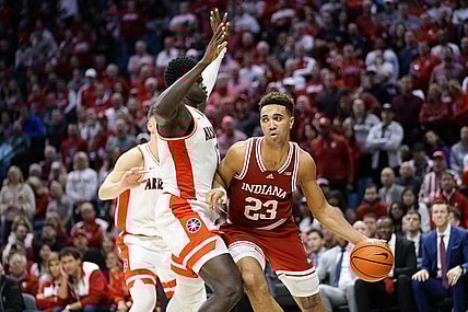 Dec 10, 2022; Las Vegas, Nevada, USA; Indiana Hoosiers forward Trayce Jackson-Davis (23) controls the ball against Arizona Wildcats center Oumar Ballo (11) during the second half at MGM Grand Garden Arena. Mandatory Credit: Lucas Peltier-USA TODAY Sports