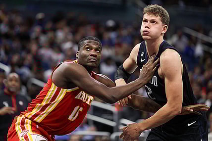 Dec 14, 2022; Orlando, Florida, USA;  Atlanta Hawks center Clint Capela (15) boxes out Orlando Magic center Moritz Wagner (21) in the fourth quarter at Amway Center. Mandatory Credit: Nathan Ray Seebeck-USA TODAY Sports
