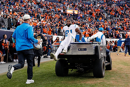 Jan 8, 2023; Denver, Colorado, USA; Los Angeles Chargers wide receiver Mike Williams (81) is carted off the field in the second quarter against the Denver Broncos at Empower Field at Mile High. Mandatory Credit: Isaiah J. Downing-USA TODAY Sports