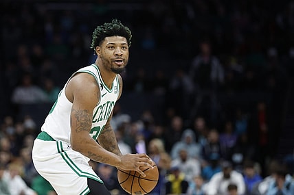 Jan 14, 2023; Charlotte, North Carolina, USA; Boston Celtics guard Marcus Smart (36) looks to pass against the Charlotte Hornets during the first half at Spectrum Center. The Boston Celtics won 122-106. Mandatory Credit: Nell Redmond-USA TODAY Sports