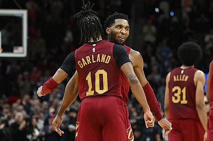 Dec 16, 2022; Cleveland, Ohio, USA; Cleveland Cavaliers guard Darius Garland (10) celebrates with guard Donovan Mitchell (45) during the second half against the Indiana Pacers at Rocket Mortgage FieldHouse. Mandatory Credit: Ken Blaze-USA TODAY Sports