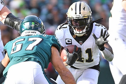 Jan 1, 2023; Philadelphia, Pennsylvania, USA; New Orleans Saints running back Alvin Kamara (41) carries the ball against Philadelphia Eagles linebacker T.J. Edwards (57) during the second quarter at Lincoln Financial Field. Mandatory Credit: Eric Hartline-USA TODAY Sports