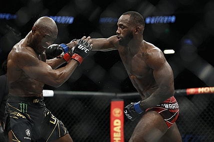 Aug 20, 2022; Salt Lake City, Utah, USA; Kamaru Usman (red gloves) fights Leon Edwards (blue gloves) during UFC 278 at Vivint Arena. Mandatory Credit: Jeffrey Swinger-USA TODAY Sports