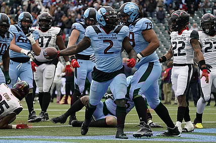 Feb 18, 2023; Arlington, TX, USA; Arlington Renegades running back De'Veon Smith (2) reacts after a successful two-point conversation during the second half at Choctaw Stadium. Mandatory Credit: Raymond Carlin III-USA TODAY Sports