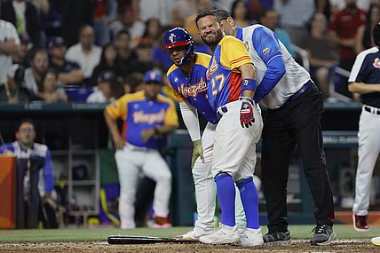 Mar 18, 2023; Miami, Florida, USA; Venezuela second baseman Jose Altuve (27) reacts after getting hit by a pitch during the fifth inning against the USA at LoanDepot Park. Mandatory Credit: Sam Navarro-USA TODAY Sports