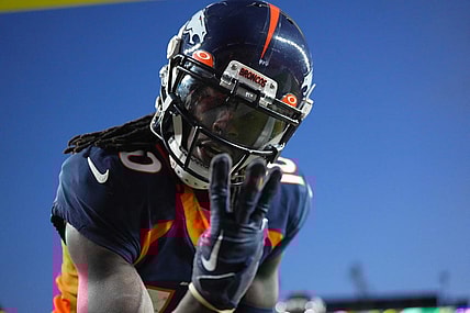 Dec 11, 2022; Denver, Colorado, USA; Denver Broncos wide receiver Jerry Jeudy (10) reacts to his third touchdown reception of the game in the fourth quarter against the Kansas City Chiefs at Empower Field at Mile High. Mandatory Credit: Ron Chenoy-USA TODAY Sports