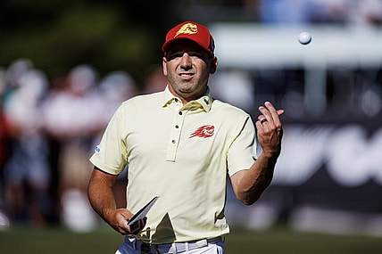 Apr 21, 2023; Adelaide, South Australia AUS; Sergio Garcia of team Fireballs throw a ball to the crowd during the first round of LIV Golf Adelaide golf tournament at Grange Golf Club. Mandatory Credit: Mike Frey-USA TODAY Sports