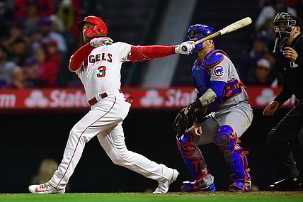 Jun 6, 2023; Anaheim, California, USA; Los Angeles Angels left fielder Taylor Ward (3) hits a solo home run against the Chicago Cubs during the seventh inning at Angel Stadium. Mandatory Credit: Gary A. Vasquez-USA TODAY Sports