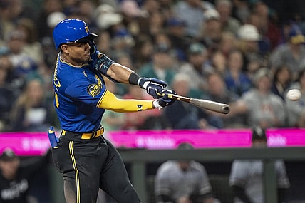 Jun 16, 2023; Seattle, Washington, USA; Seattle Mariners centerfielder Julio Rodriguez (44) hits a double off Chicago White Sox starting pitcher Michael Kopech (34) during the fifth inning at T-Mobile Park. Mandatory Credit: Stephen Brashear-USA TODAY Sports