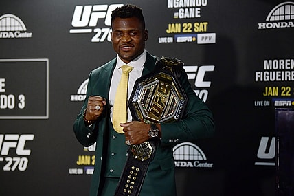 Jan 22, 2022; Anaheim, California, USA; Francis Ngannou poses for photos following his championship victory at UFC 270 at Honda Center. Mandatory Credit: Gary A. Vasquez-USA TODAY Sports