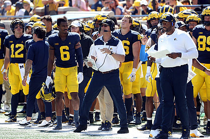 Michigan Wolverines head coach Jim Harbaugh and offensive coordinator Sherrone Moore, pictured during 

Michigan's 2022 season opener.