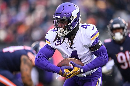 Jan 8, 2023; Chicago, Illinois, USA; Minnesota Vikings running back Dalvin Cook (4) runs the ball during the first quarter against the Chicago Bears at Soldier Field. Mandatory Credit: Daniel Bartel-USA TODAY Sports