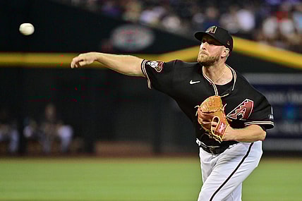 Aug 9, 2023; Phoenix, Arizona, USA;  Arizona Diamondbacks starting pitcher Merrill Kelly (29) throws in the first inning against the Los Angeles Dodgers at Chase Field. Mandatory Credit: Matt Kartozian-USA TODAY Sports